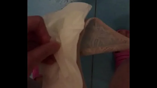 Brunette pissing during her period standing change pad showing dirty pussy and dirty pad