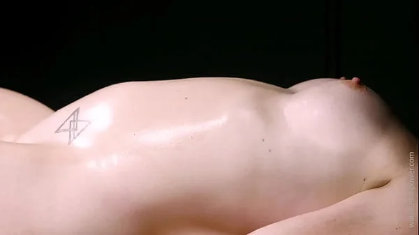 Lexi is strapped to the bondange bench and has her six pack inflated out of existence with an enema