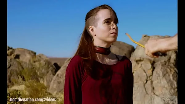 Petite, hardcore submissive masochist Brooke Johnson drinks piss, gets a hard caning, and get a severe facesitting rimjob session on the desert rocks of Joshua Tree in this Domthenation documentary