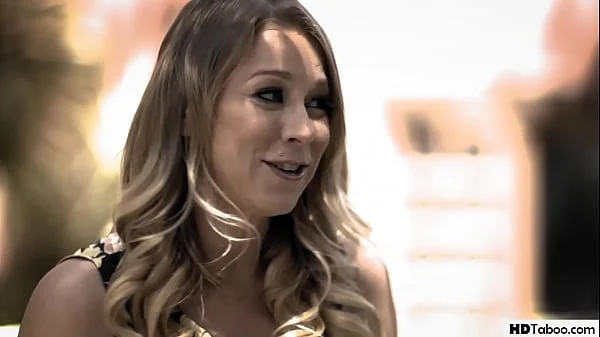 Two wives Dee Williams and Katie Morgan in each other's arms...