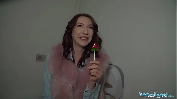 Public Agent Chanel Kiss lollipop sucker is taken from behind after giving a worldclass blowjob